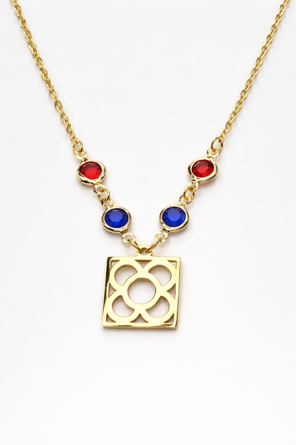 Colgante con la Flor de Barcelona de acero inoxidable con cristal azul y rojo para mujer.