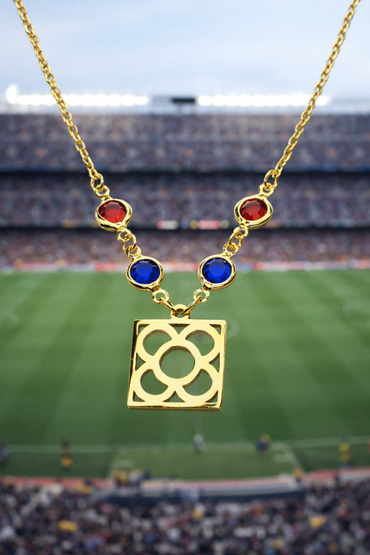 Colgante con la Flor de Barcelona de acero inoxidable con cristal azul y rojo para mujer.