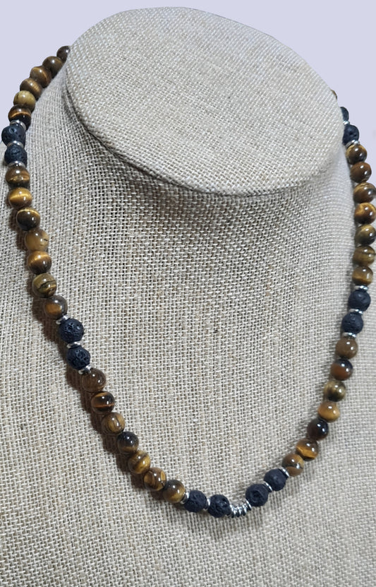 Collar de cuentas Ojo de Tigre, Lava volcánica y Discos de Acero. Posa sobre cuello.