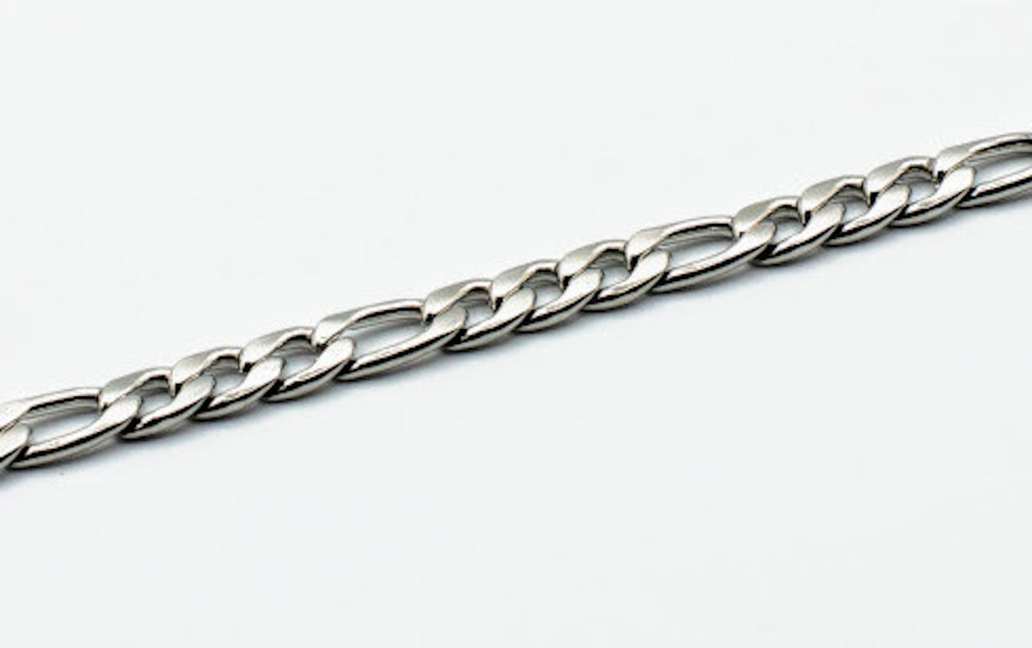 Cadena y pulsera Fígaro 7mm | Acero Inoxidable