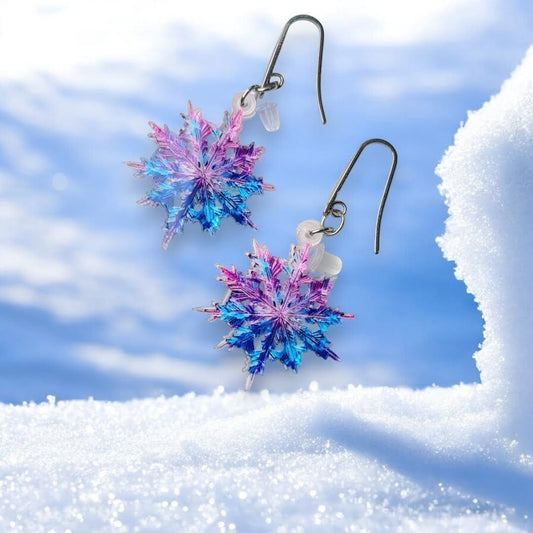 Pendientes Copo de Nieve para mujer en Acero y Acrílico. Posa sobre nieve.