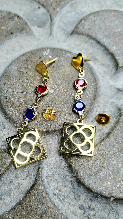 Pendientes con la Flor de Barcelona de acero inoxidable con cristal azul y rojo para mujer.
