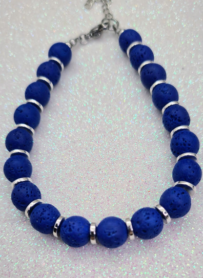 Pulsera de Lava Volcánica y Discos Plateados para mujer.