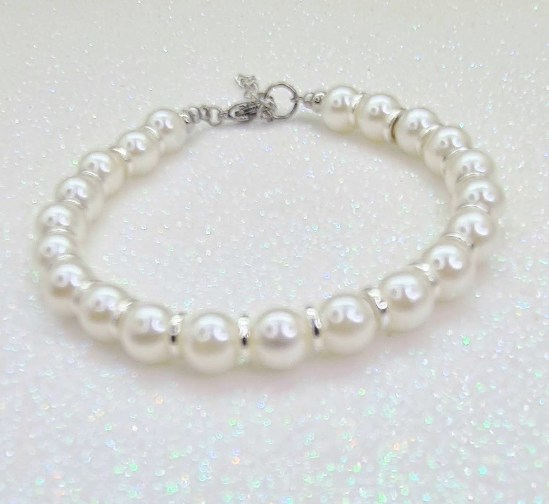 Pulsera de Perlas de agua dulce y Discos Plateados para mujer.