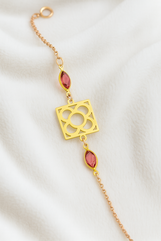 Pulsera de acero inoxidable dorado con Flor de Barcelona y lágrimas para mujer.